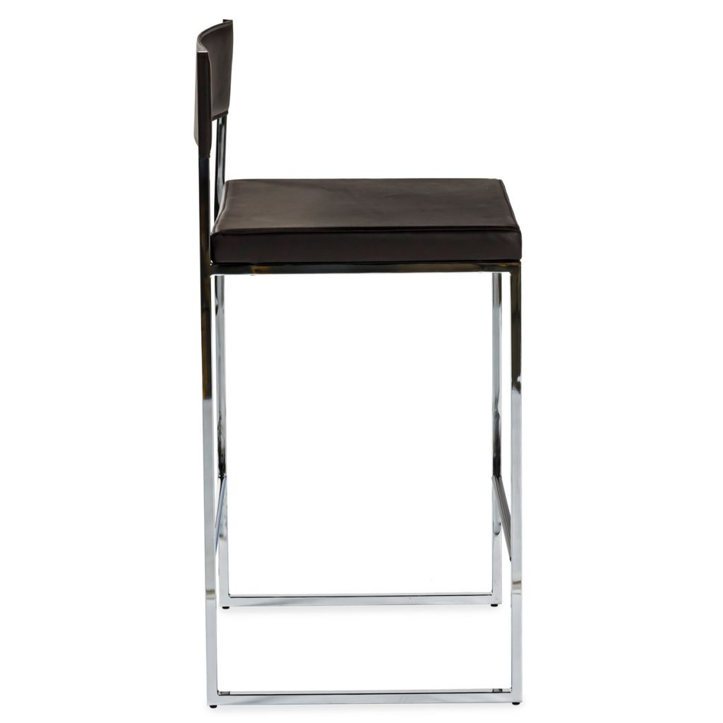 Chic counter stool with plush leather cushions a white background.