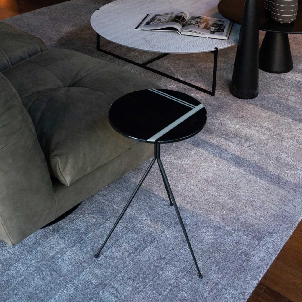 Matte black metal base offers sleek and modern aesthetics.