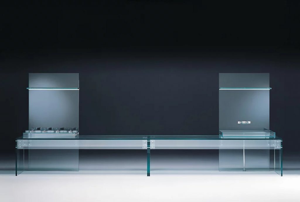 elegant and sophisticated transparent glass counter behind a black background