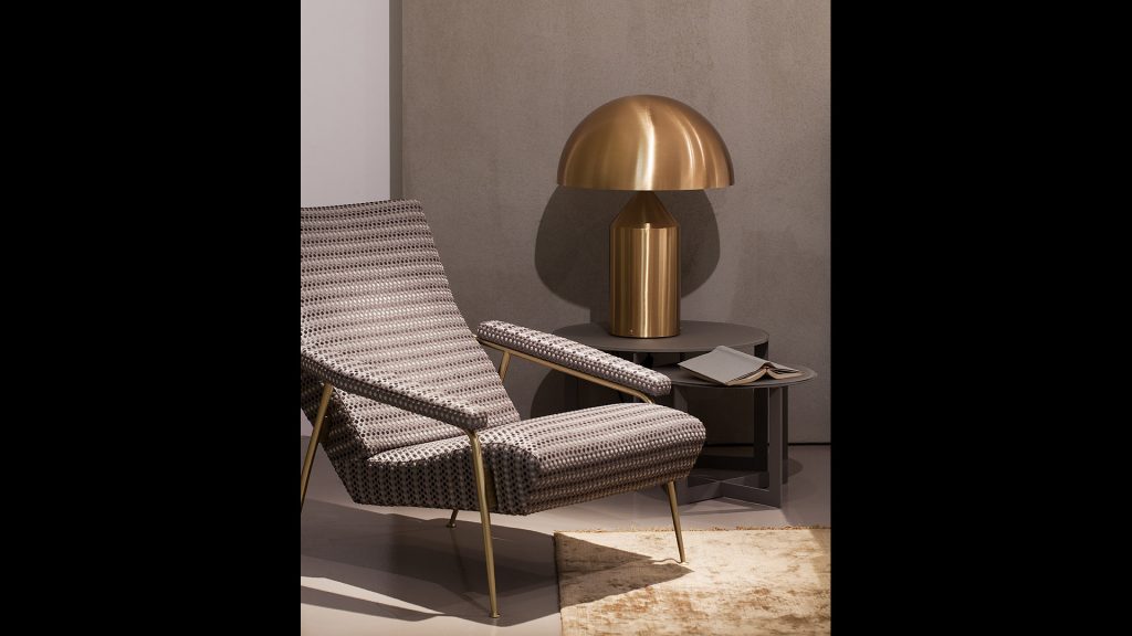 golden metal lamp and mushroom-shaped LED lights in a room