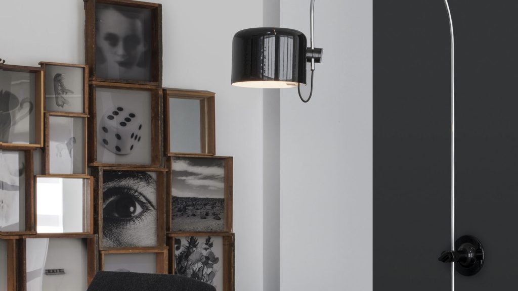 curved square-shaped lamp made of metal and aluminum base painted in a black tone