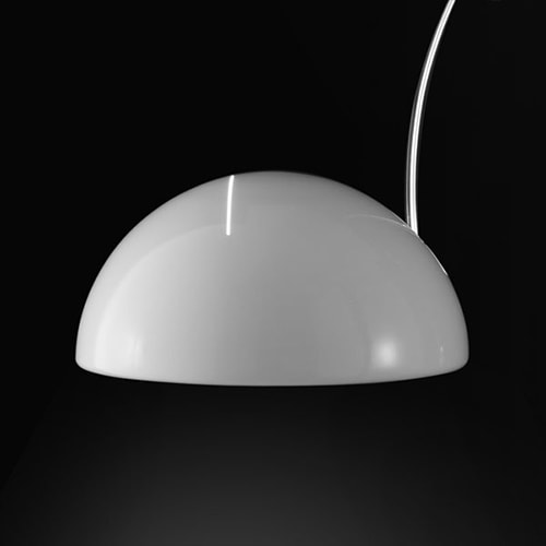 lamp made of white glass and white metal in the shape of a dome or semicircle in a blackground.