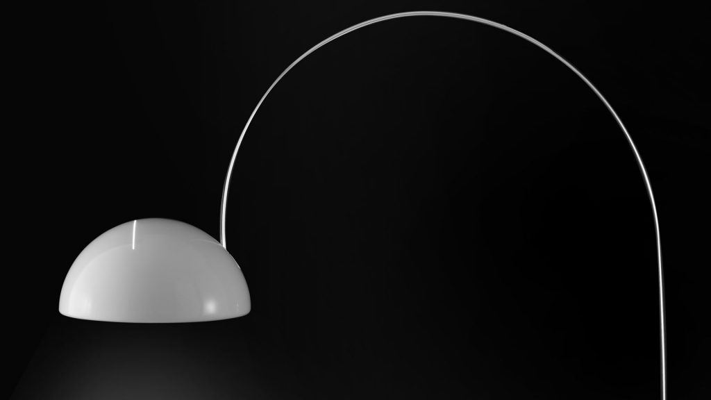 lamp made of white glass and white metal in the shape of a dome or semicircle in a balck background.