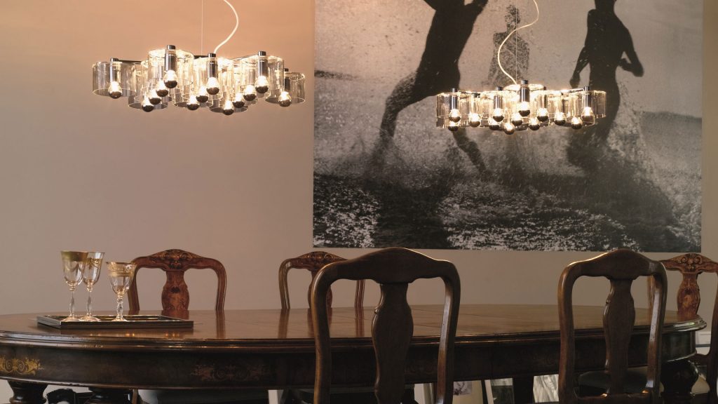 line of lamps made from fused glass in the shape of a flower