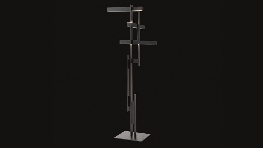 lamp made in a shape of uneven bricks on an aluminum base in a black tone in a blackground