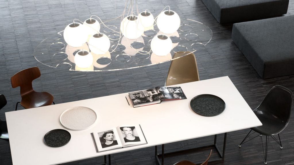 hanging lamp made of transparent methacrylate and white luminous glass spheres