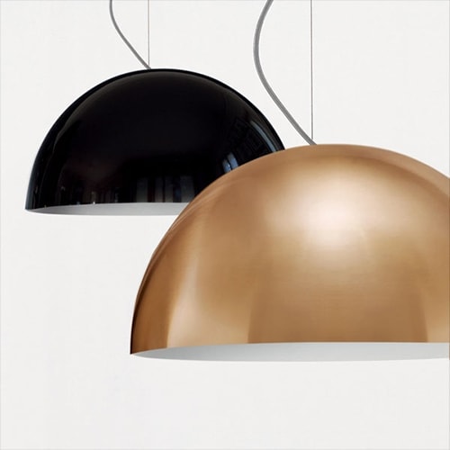 lamp made of black and golden aluminum in the shape of a dome