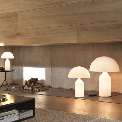 lamps made of transparent white glass in the shape of a large and small mushroom