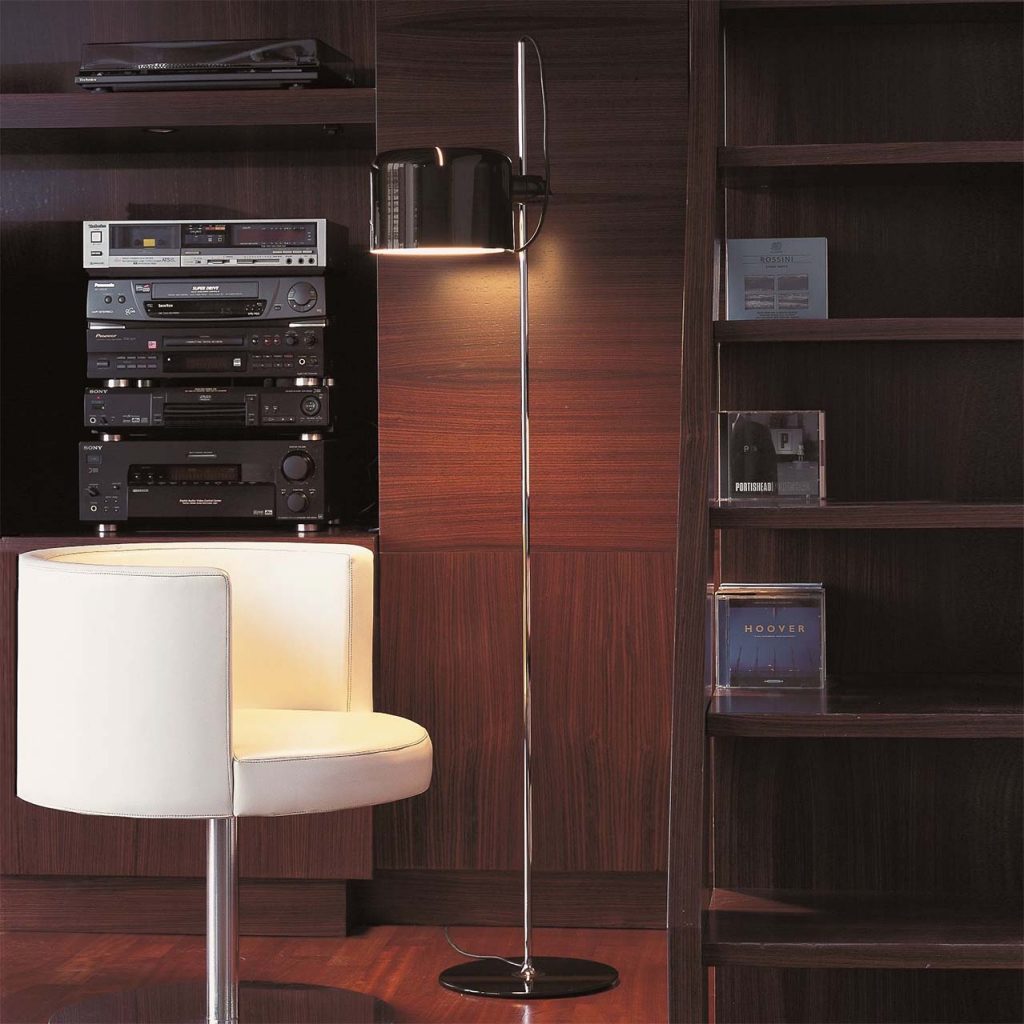 long floor lamp made of aluminum and metal base in a gold-black color tone