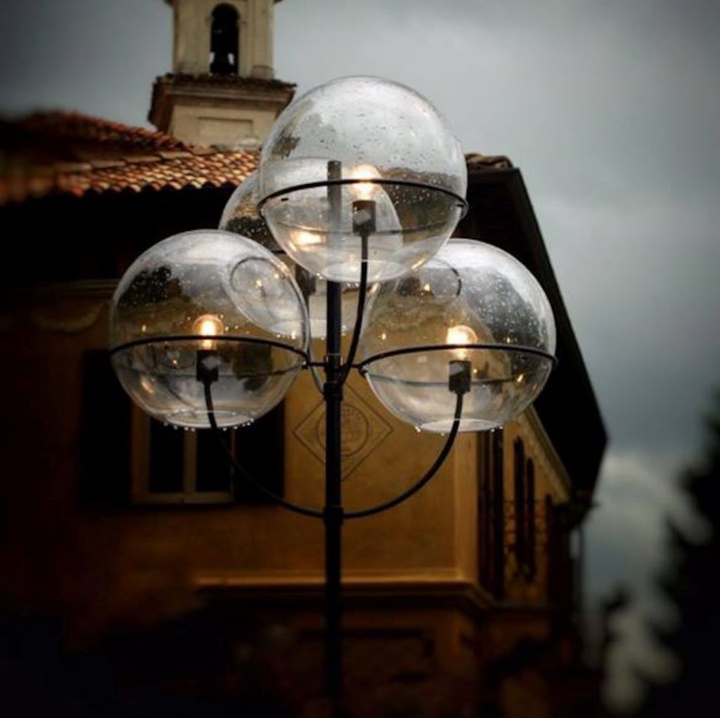 classic lamps made with four transparent spheres and black metal base