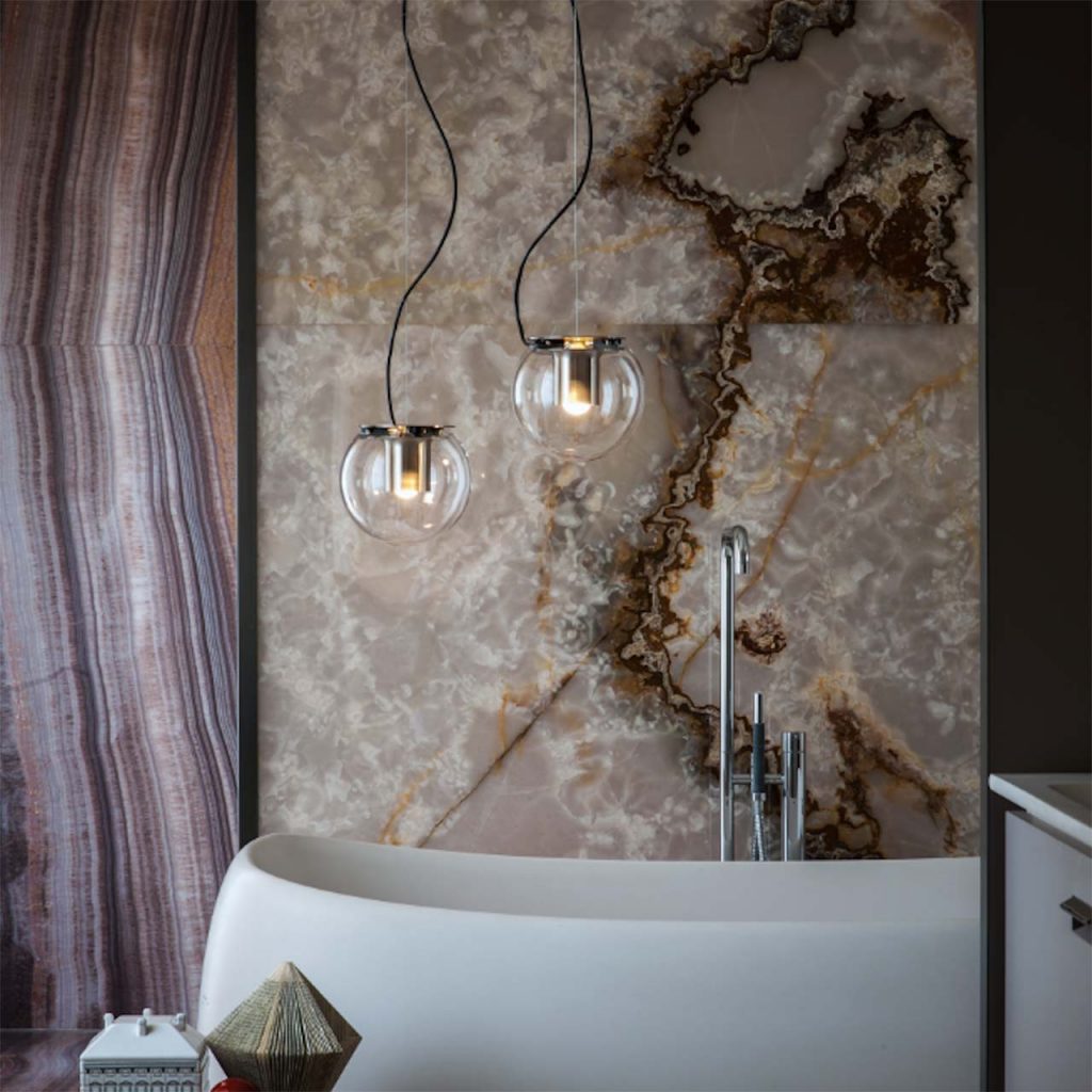 ceiling lamps in the shape of glass spheres and thin black metal bases