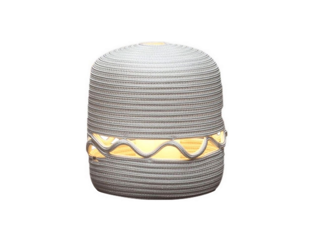 Sewn rope cord in a captivating spiral pattern.