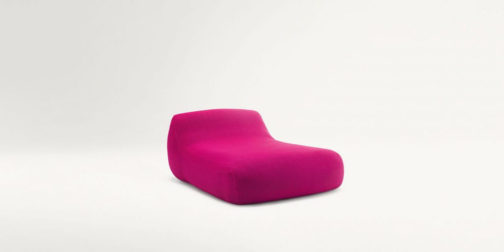 pouf with backrest made of fabric and foam in a hot pink tone on a white background