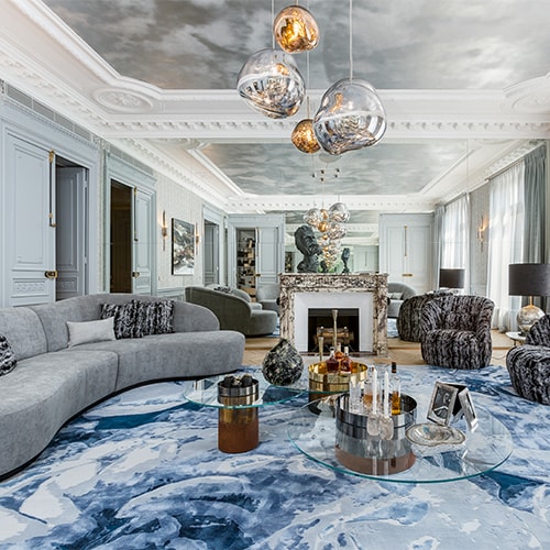 rug made of silk and wool by hand with a wave-shaped design in a blue and white tone