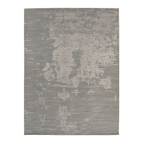 rug made of bamboo silk wool in a gray tone with a relief-shaped design