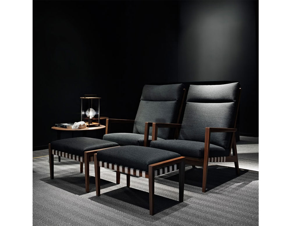 Sofas made of brown wood base and upholstered in black fabric