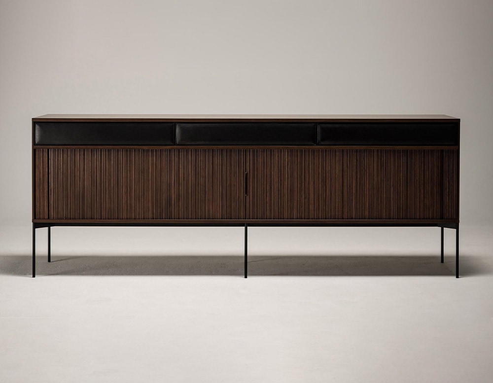 large dark brown sideboard made of cane on a white background