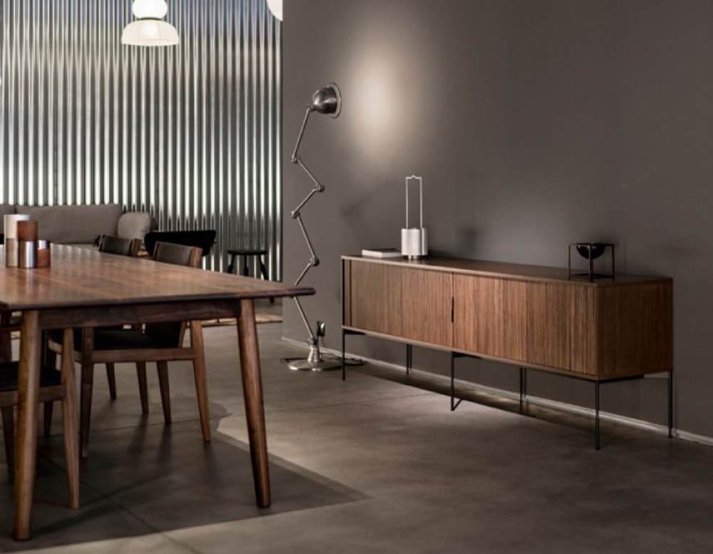 dark brown sideboard made with cane by hand on a living room