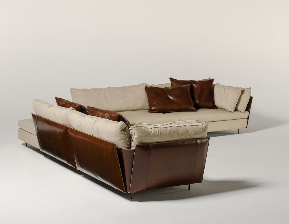 sofa made of beige fabric and dark brown finishes in a white background