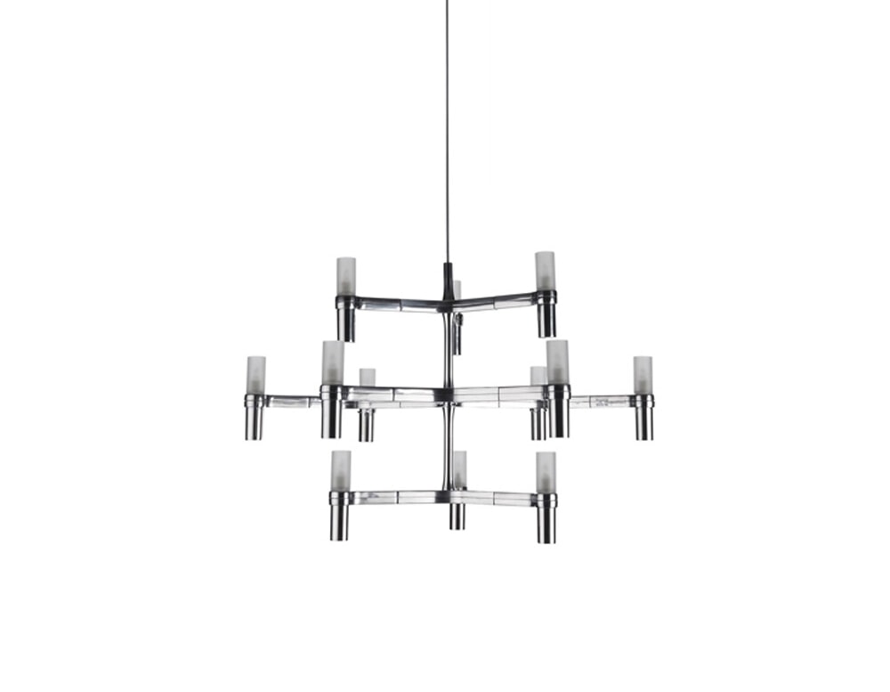 spider-shaped lamp made of metal in shades of silver and white in an white background