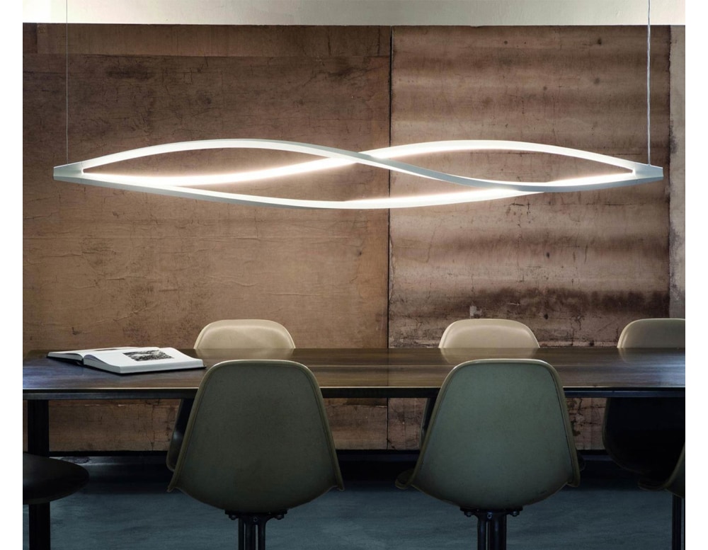hanging lamp made of white-dyed metal in a living room