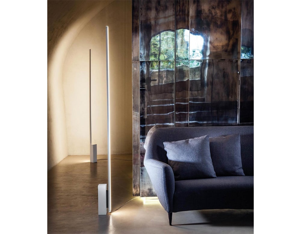 line-shaped floor lamp made of white painted metal