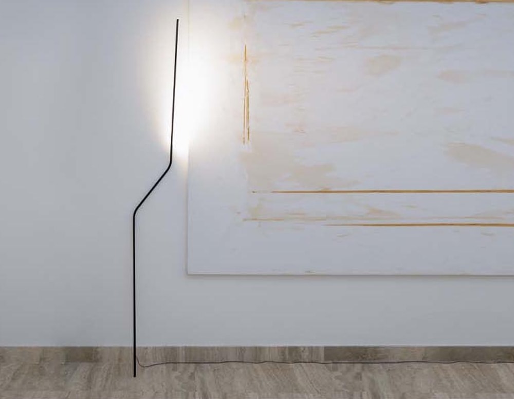 slim mobile lamp made of black metal with LED lighting