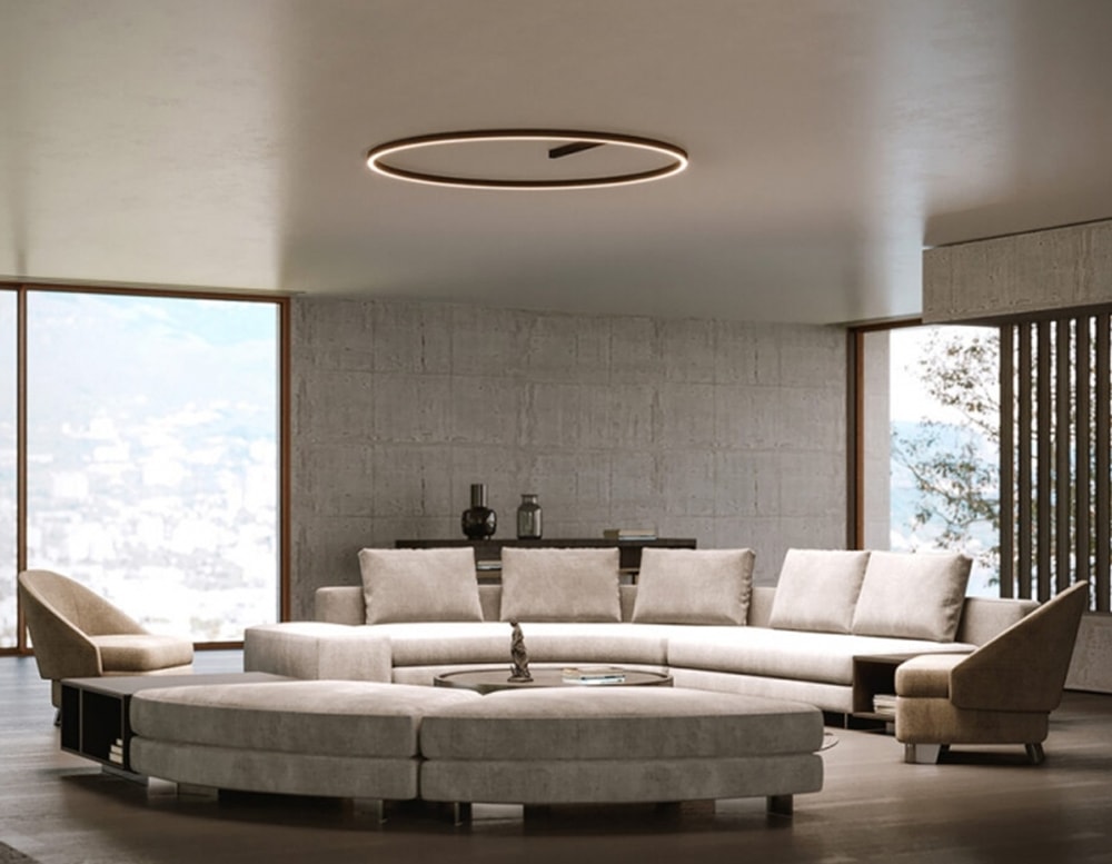 circular hanging lamp made of black metal in a living room