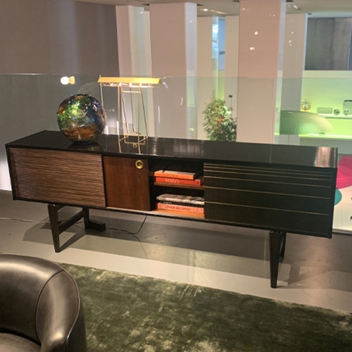 sideboard made of lacquered wood in a black and brown tone