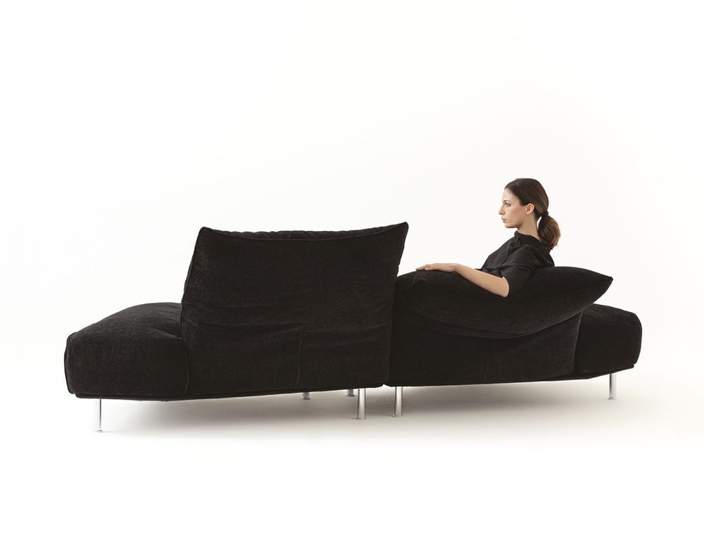 sofa made of soft dye and light brown glitter and metal base on a white background