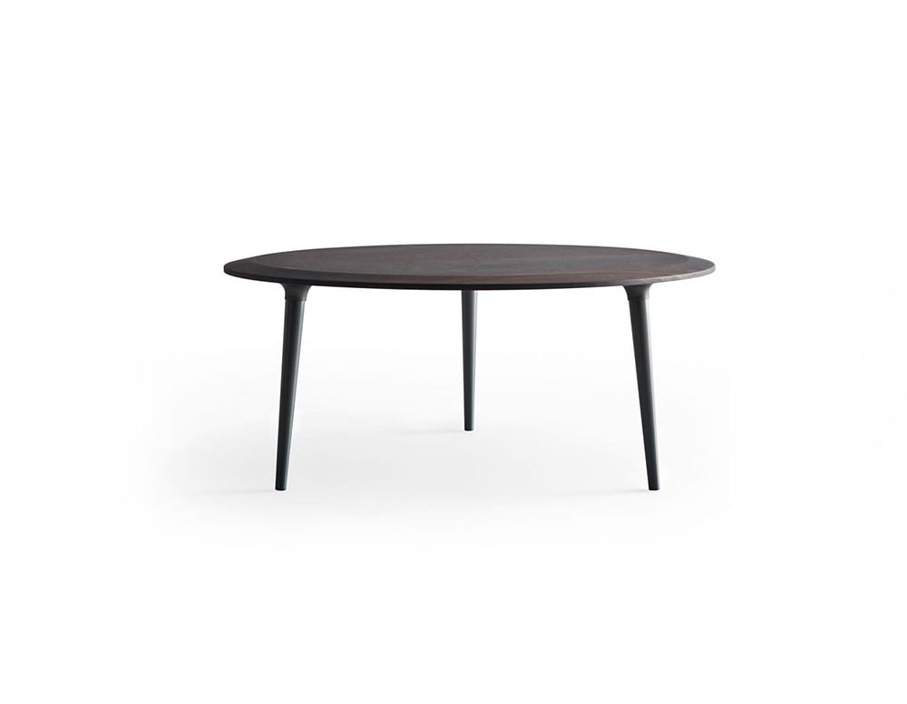 small oval table made of Eucalyptus and pewter metal legs in black and brown tones in a white background