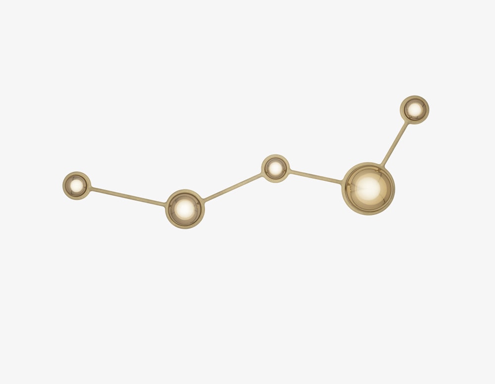ceiling lamp made of metal and LED light made of spheres joined by a metal tube in a gold tone in a white background