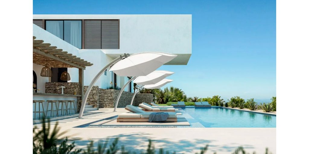 line of umbrellas in octagon shapes made of fabric and metal at their bases in shades of white color on the outside