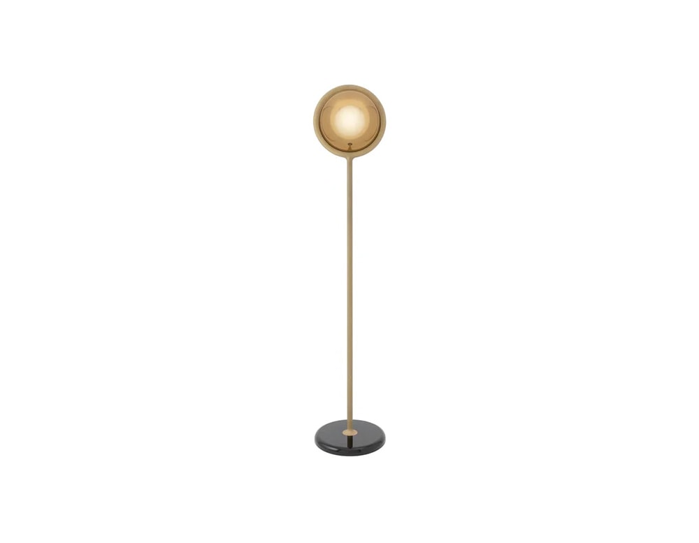 Floor lamp made of metal by hand in gold and white tone for its LED lighting on a white background.