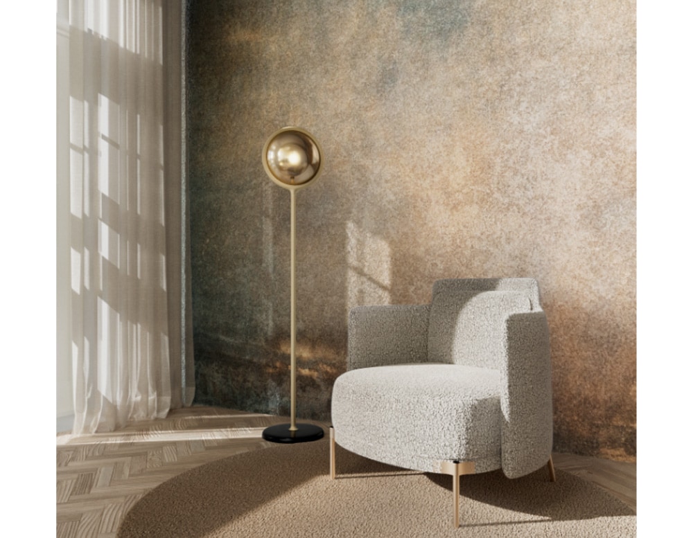 floor lamp made of metal its design with a trunk tube and at the top made in a sphere shape all in gold tone