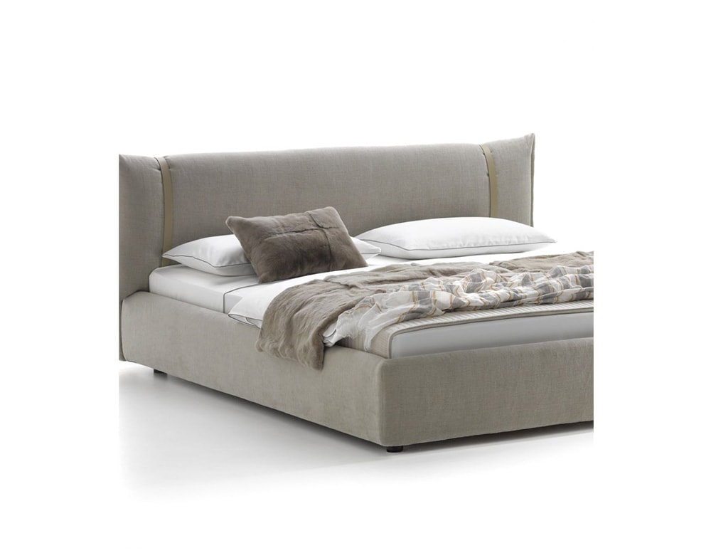 Fabric covering adds warmth and texture.