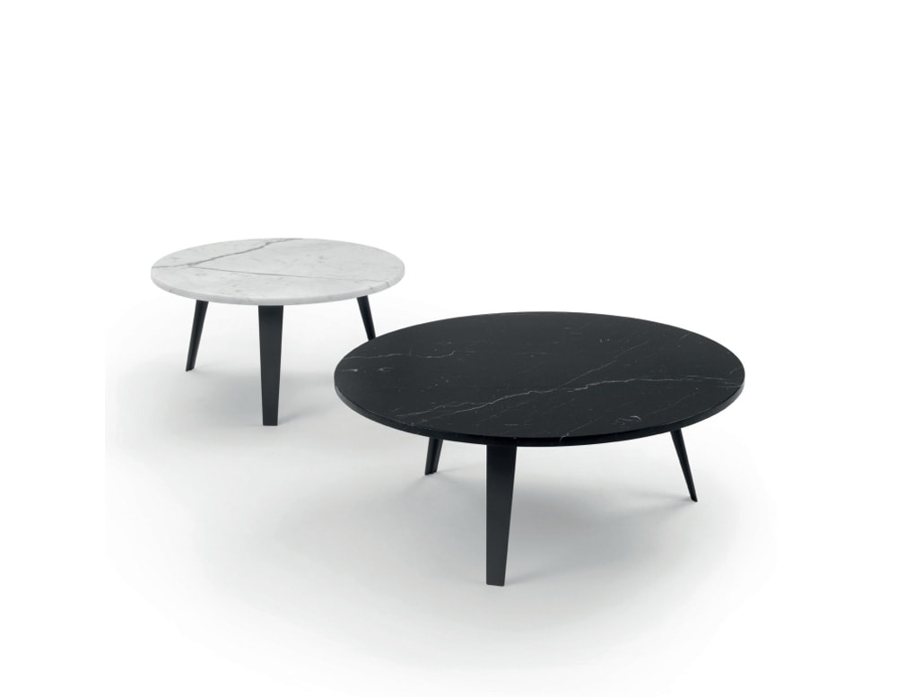 small circle-shaped tables in black or white with aluminum base