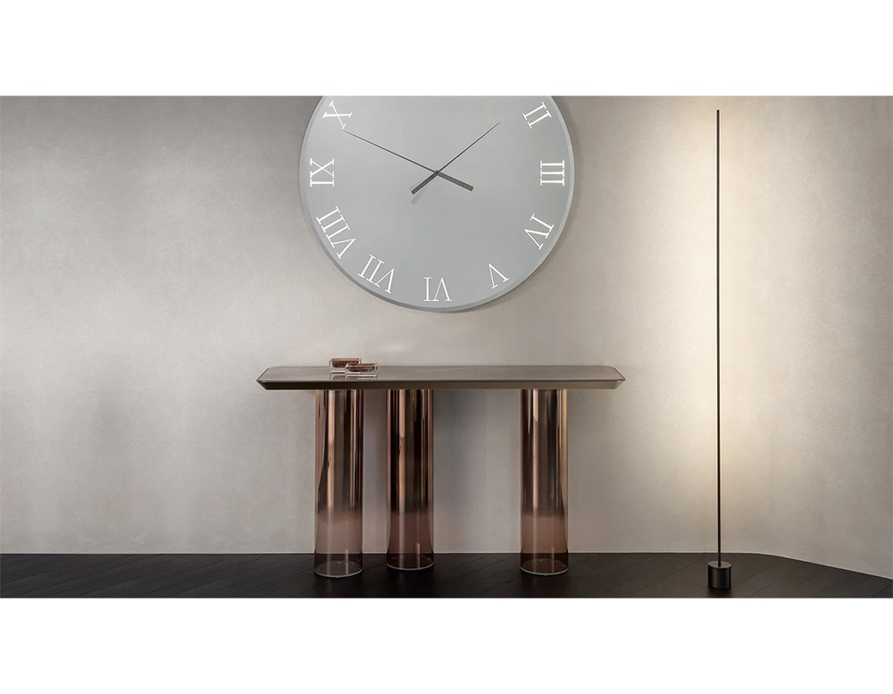 table made of shiny pink brass with only 3 axes in a quarter
