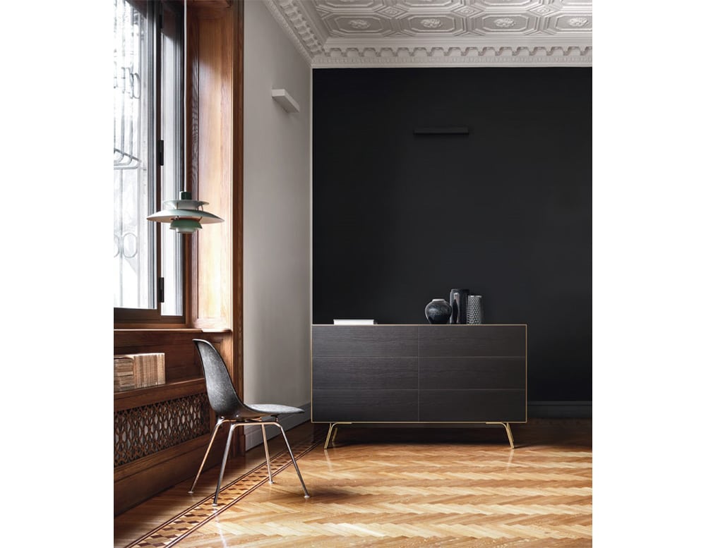 veneered table made of black wood and metal base