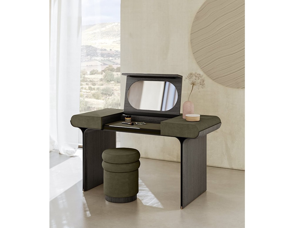 puff made of wood and polyurethane foam in dark green tone in a living room