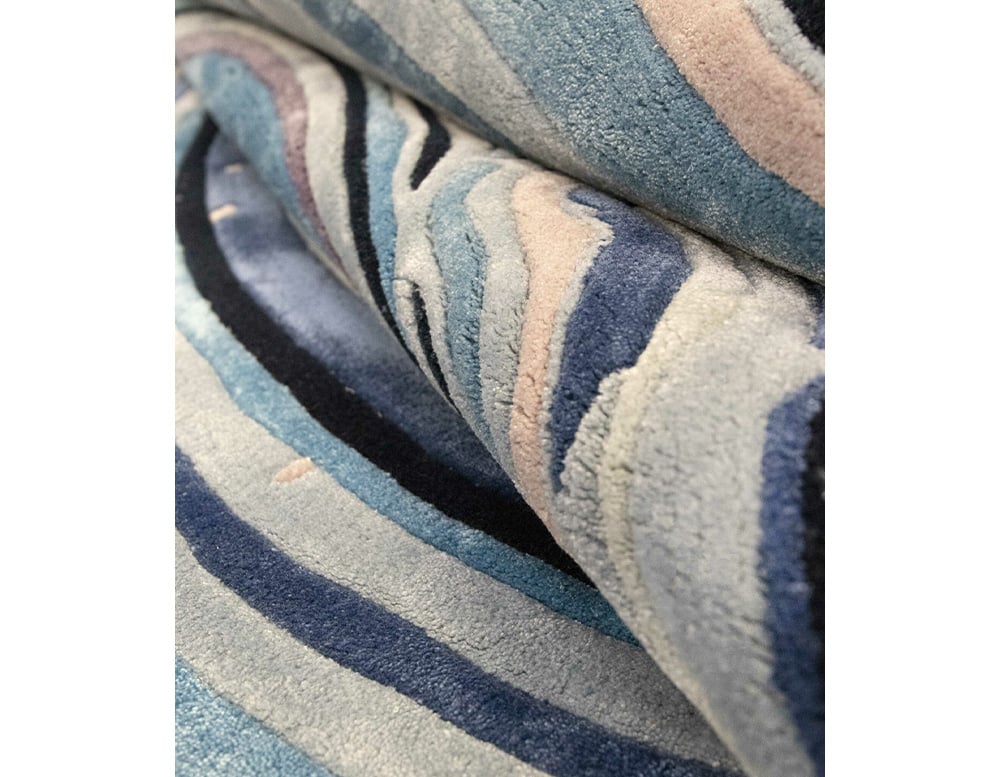 rug made of fabric with finishes inspired by the 