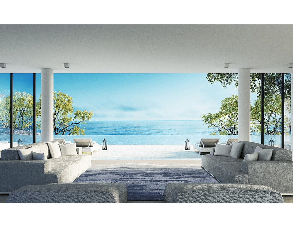 blue and white rug made with wool, knotted and hand finished in a living room