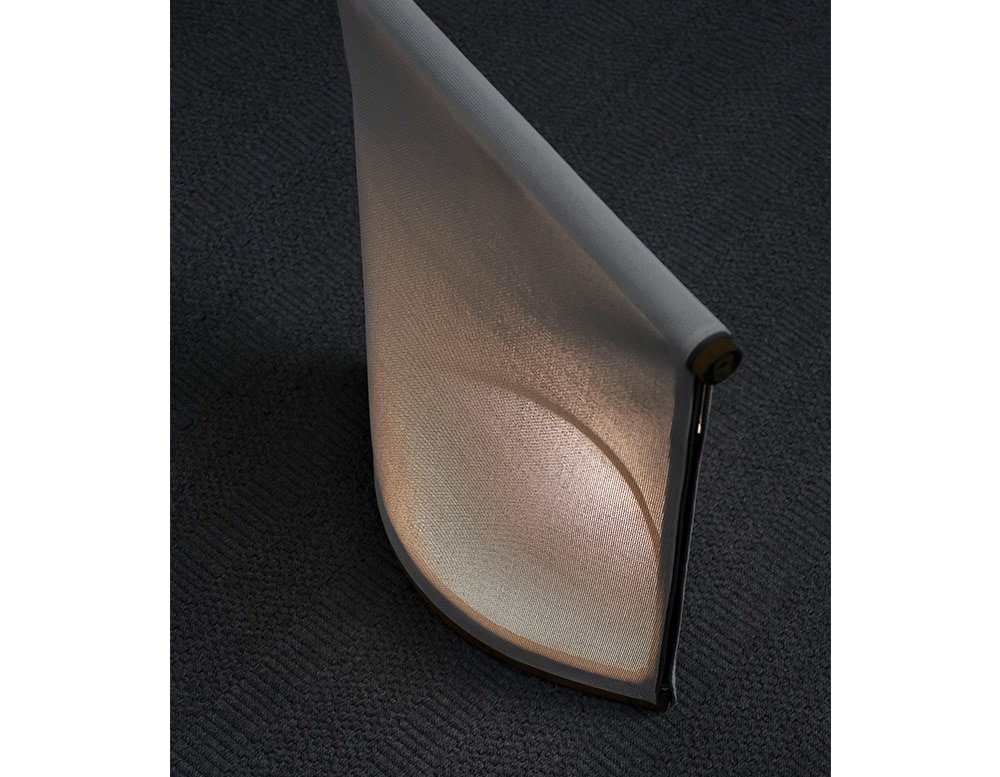 small sculpture made of teak and wood with LED lighting