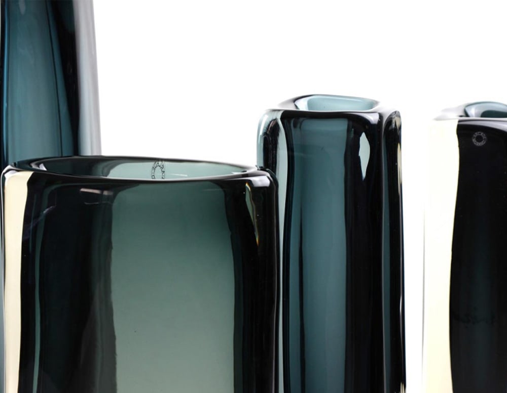 long square glass sculptures with a square-shaped opening at the top