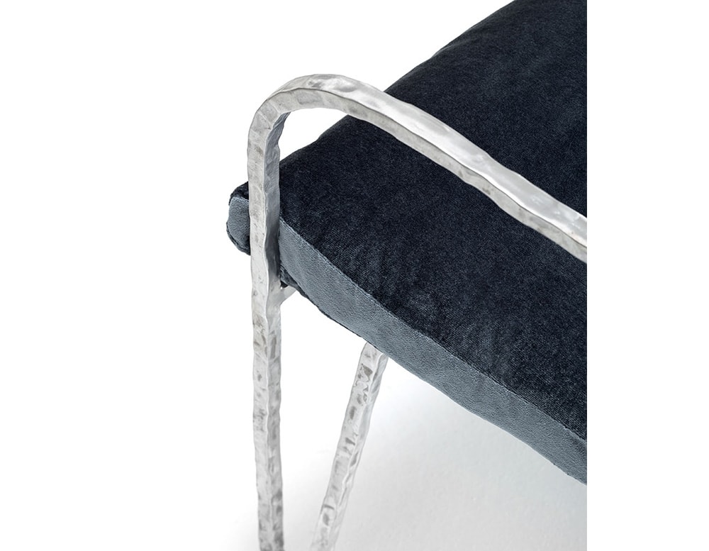 chair made of white aluminum and blue fabric on a white background