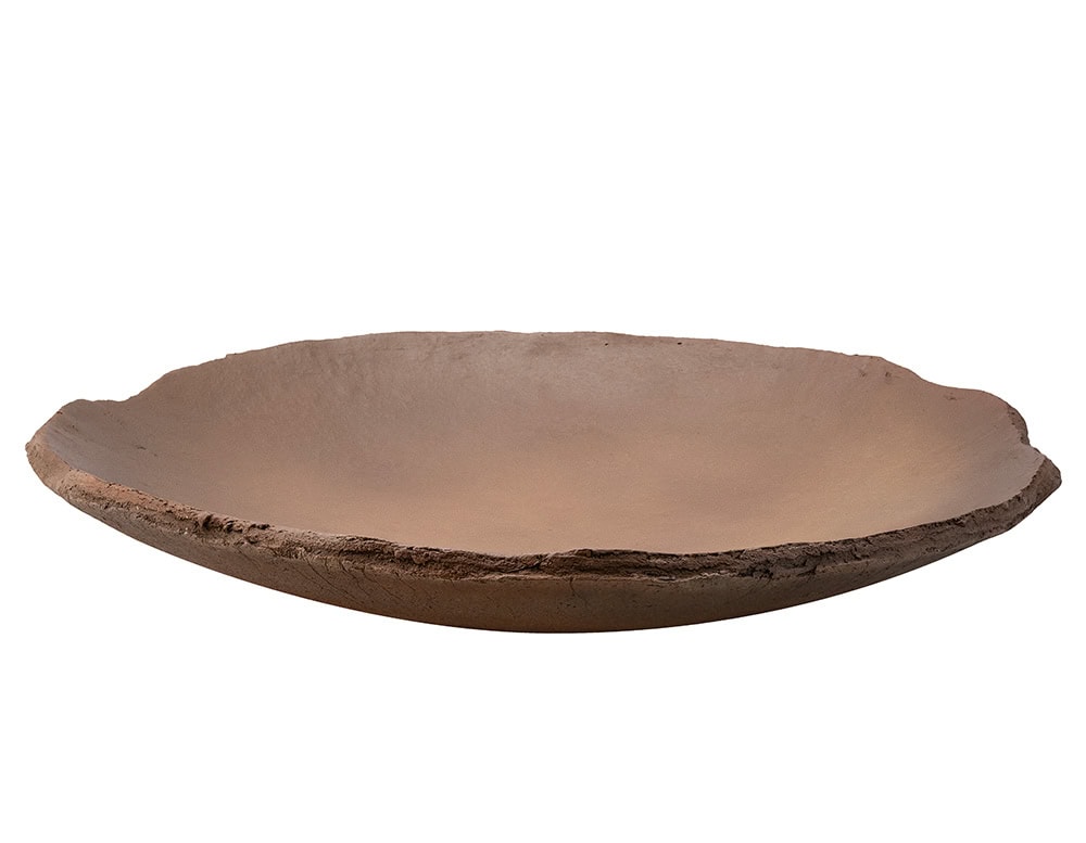 Handcrafted with a natural raw finish this wide shallow bowl blends rustic charm with refined elegance making it ideal as a statement accessory or functional centerpiece for modern interiors.