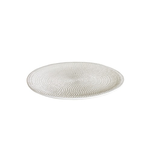 small round white ceramic plate with circular finishes behind a white background