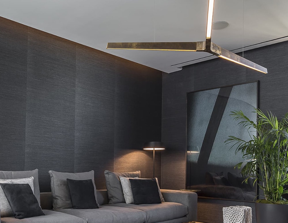 Bronce color ceiling lighting In Burnished Brass with Sand Casting Brass finish in a living room