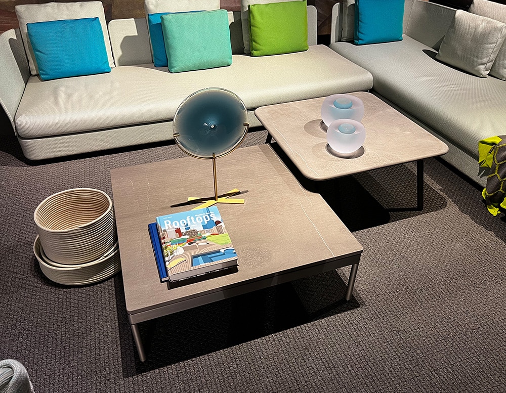 Roda side tables in a light brown tone, made of stone and wood in a living room
