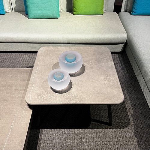small coffee table made of wood and farsena stone.